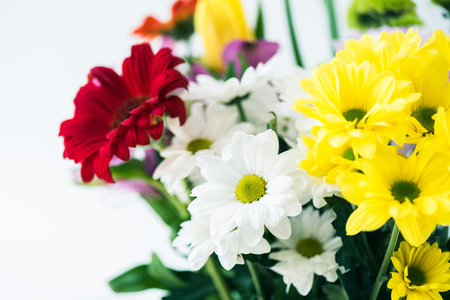close-up view of beautiful bouquet of blooming flowers isolated on greyの写真素材