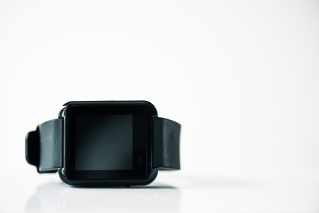 close-up view of smartwatch with black screen on greyの写真素材