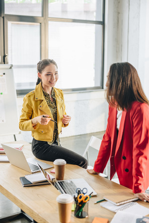 Professional business colleagues women in modern officeの写真素材
