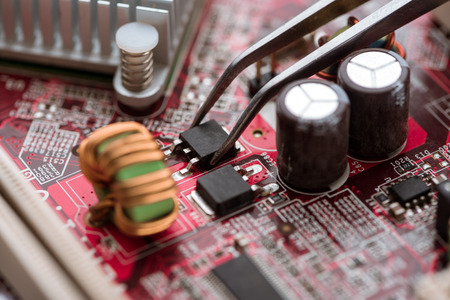 Assembling digital circuit board with microchips and components