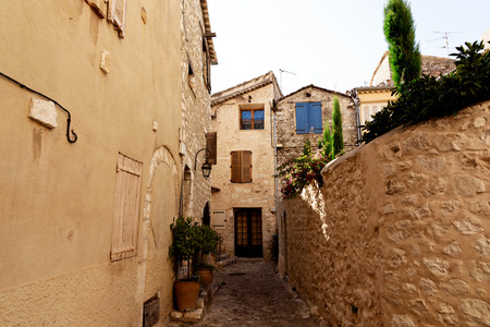 narrow street with small houses at old town, Antibes, Franceの写真素材
