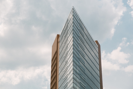 BERLIN, GERMANY - JUNE 20, 2017: modern designed skyscraper and blue cloudy sky, Potsdamer Platz, Berlin, Germanyの写真素材