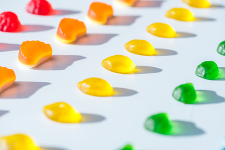 collection of sweet colored jelly candies on whiteの写真素材