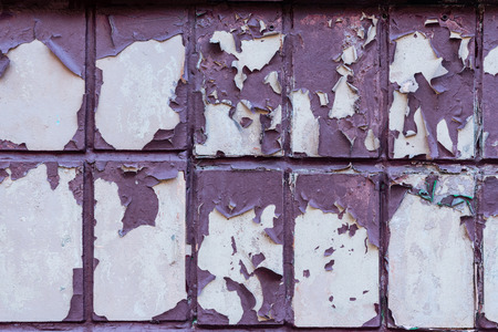 close-up view of old weathered purple wall textured backgroundの写真素材