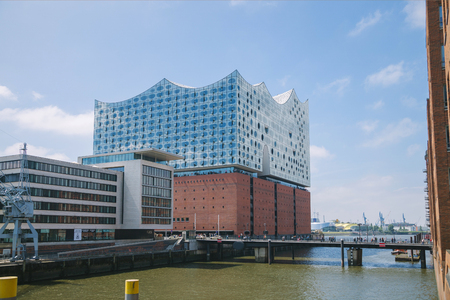HAMBURG, GERMANY - 28 JUNE 2018: elbphilharmonie (elbe philharmonic hall) and elbe river