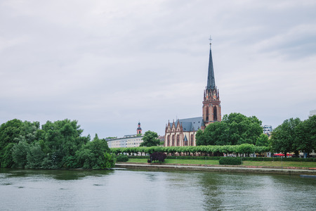 FRANKFURT, GERMANY - 28 JUNE 2018: beautiful old Frankfurt Church of Three Kings near main riverのeditorial素材