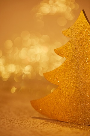 close up of golden glittering christmas tree for decorationの写真素材