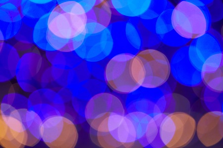 blue and violet shiny bokeh christmas background