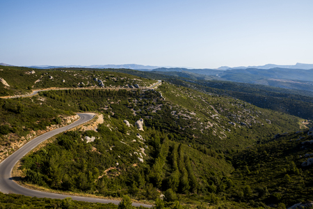 aerial view of winding road and beautiful mountains in provence, franceの写真素材