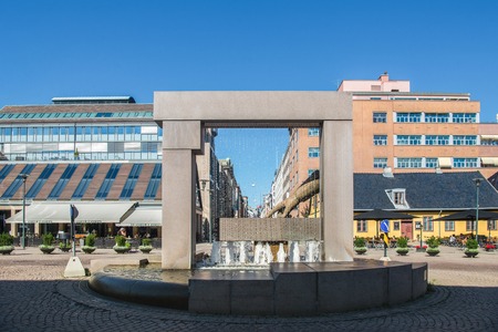 OSLO, NORWAY - 28 JULY, 2018: Fountain shaped like hand on square with beautiful architecture in Oslo, Norwayのeditorial素材