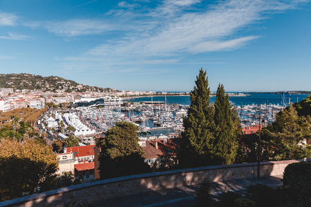 view of old european city on seashore on sunny day, Antibes, Franceの写真素材