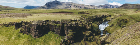 panoramic view of beautiful Skoga river flowing through highlands in Iceland