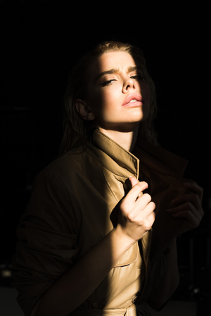 portrait of seductive woman in fashionable clothingの写真素材