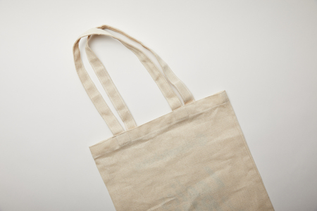 elevated view of cotton bag on white surface, minimalistic conceptの写真素材