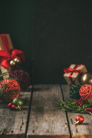 christmas decor and gift boxes on wooden table with copy spaceの写真素材