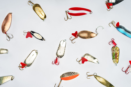 flat lay with various fishing bait isolated on whiteの写真素材