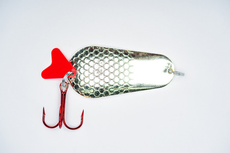 view from above of fishing bait isolated on white, minimalistic conceptの写真素材