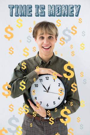 Smiling businessman holding wall clock in hands on white with dollar signs flying around