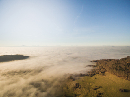 aerial view of beautiful landscape with green vegetation under clouds, Germanyの写真素材