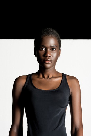 portrait of beautiful young african american woman looking at cameraの写真素材