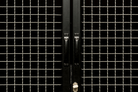 Black doors with handles and metal grit