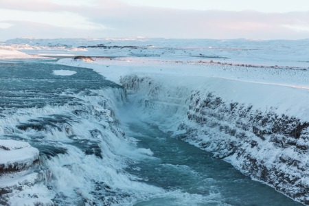 Magnificent snow-covered Icelandic landscape with Gullfoss waterfall