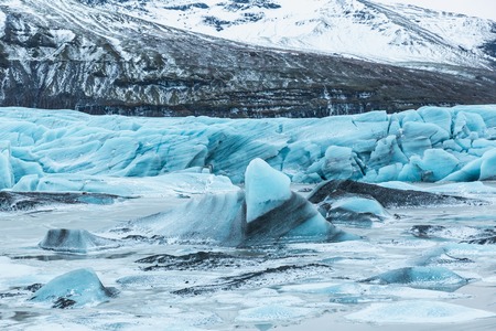 Scenic glacial landscape with mountains and Svinafellsjokull Glacier, Icelandの写真素材