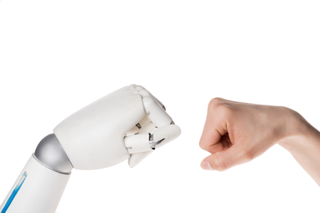 Cropped shot of robot and human making bro fist gesture isolated on white backgroundの写真素材