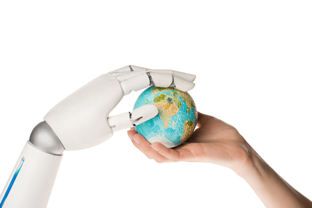 Cropped shot of robot and human holding miniature model of earth isolated on white backgroundの写真素材