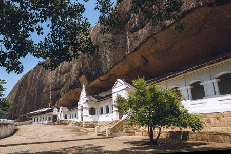 Scenic view of building with mountain behind in Dambulla, Sri Lankaの写真素材