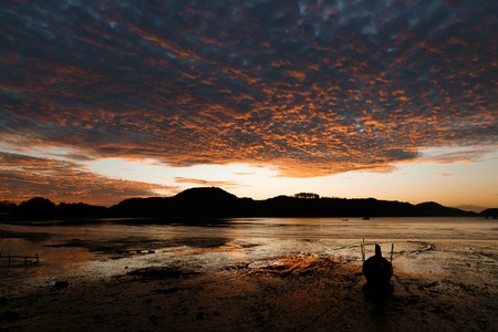 Beautiful scenic view of sunset over ocean, Phuket, Thailandの写真素材