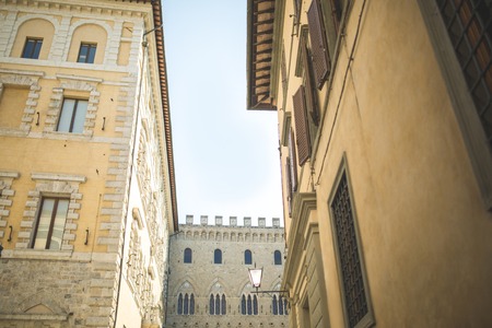 Walls of medieval buildings in city of Siennaの写真素材