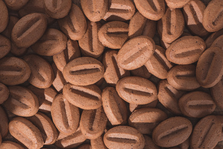 Top view of delicious cookies in shape of coffee beansの写真素材