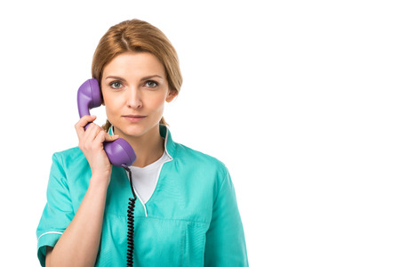 portrait of veterinarian with purple telephone tube in hand isolated on white