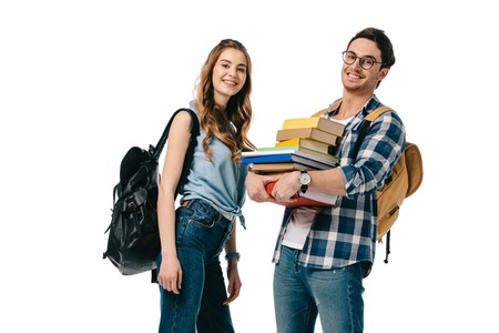 happy young students with books isolated on whiteの写真素材