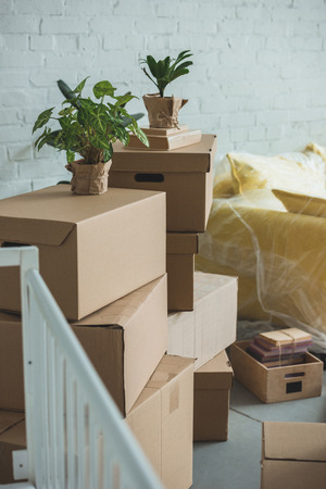 close up view of cardboard boxes in roomの写真素材