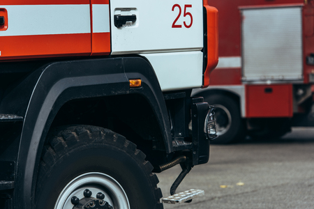 Close up view of red and white fire truck on street
