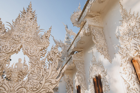 Decorative statues on Wat Rong Khun White Temple, Chiang Rai, Thailand
