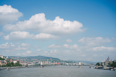 Building of Hungarian parliament on river bank in Budapest, Hungaryの写真素材