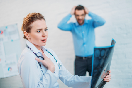 Shocked doctor received results of MRI of her patientの写真素材