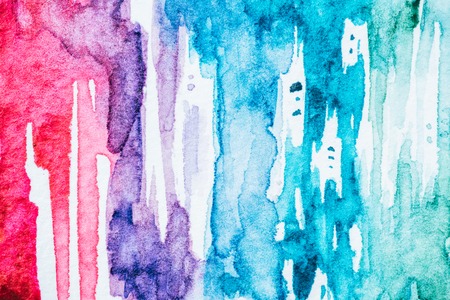 Abstract textured background with colorful watercolor strokesの写真素材