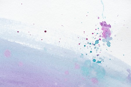 abstract background with violet and blue watercolor painting with splattersの写真素材