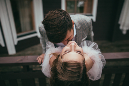 overhead view of beautiful happy couple posing for wedding shootの写真素材