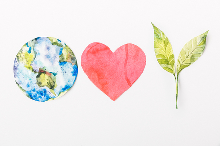 top view of paper made colorful globe, red heart and green plant isolated on grey, recycling and  environment protection conceptの写真素材