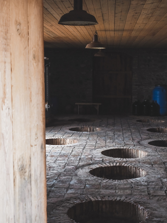 empty interior of traditional winery in Georgia