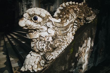 close-up view of ancient decorative oriental sculpture in Hue, Vietnamの写真素材