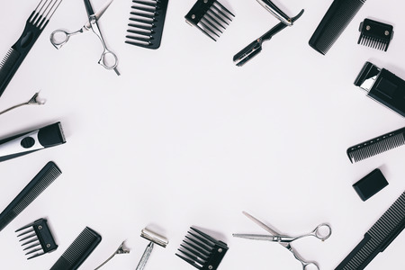 top view of arrangement of various barber tools isolated on greyの写真素材