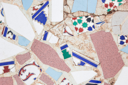 Wall with broken ceramic colored fragmentsの写真素材