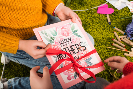 cropped shot of little children preparing greeting card for mothers dayの写真素材