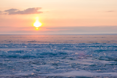 view of wavy lake water under cloudy sky on sunset, russia, lake baikalの写真素材